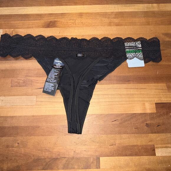 Set of 3 Calvin Klein assorted thong panty black/blue/black large - Picture 7 of 15